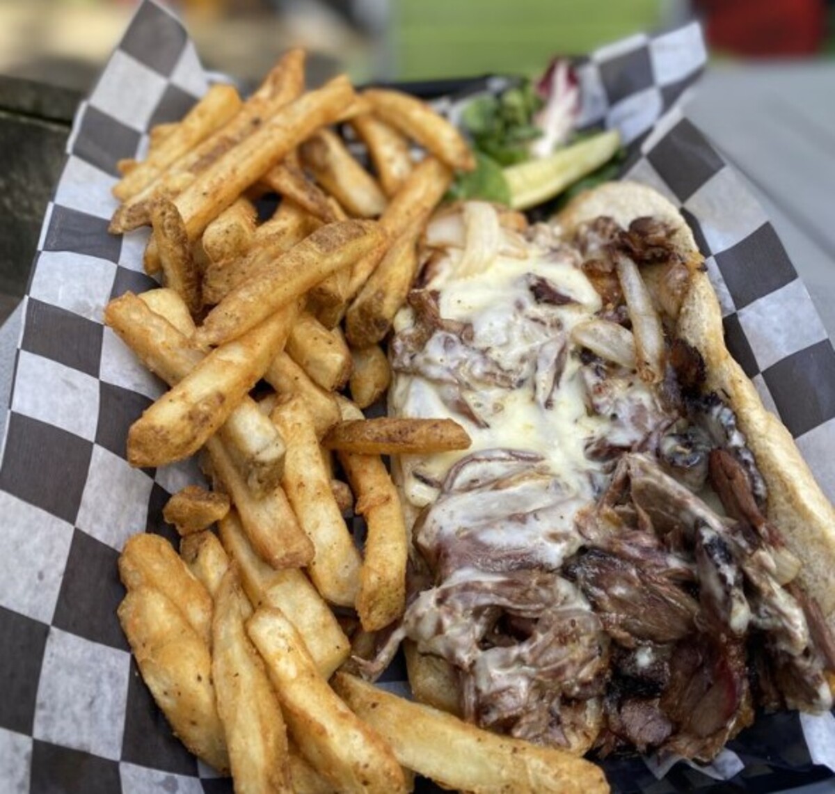 House-smoked Brisket Cheesesteak at The Pour Farm Tavern located in New Bedford, MA. 