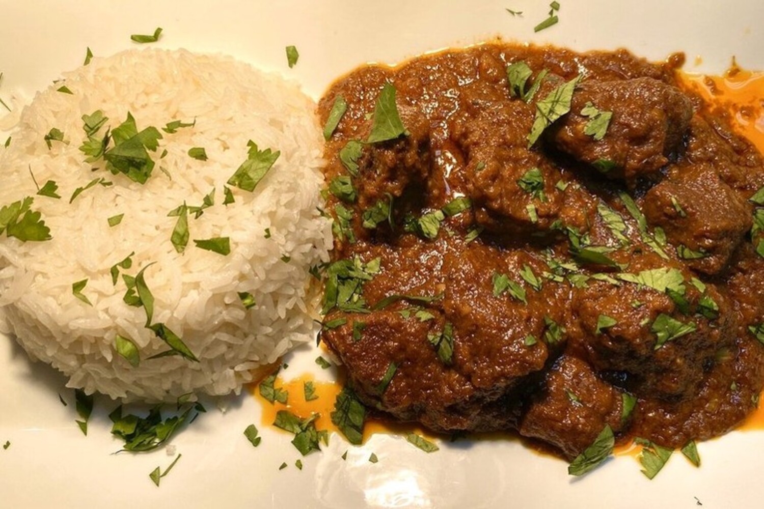 Indonesian lamb rendang with coconut pandan rice at Retro Rocks located in Saginaw, MI. 