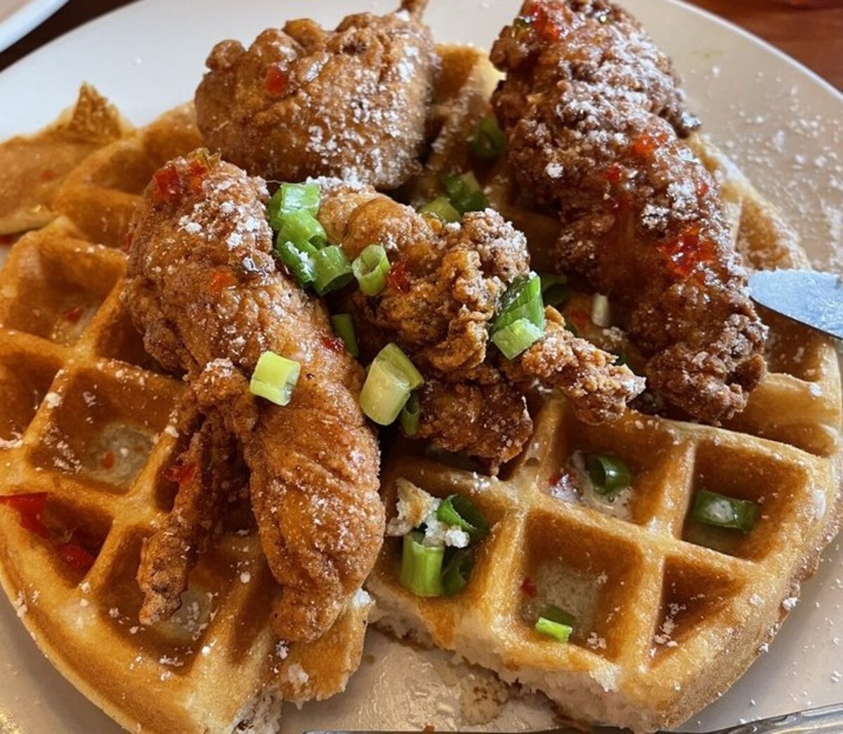 Jalapeño jelly fried chicken and waffles at Berry Fresh Cafe located in Port St Lucie. 