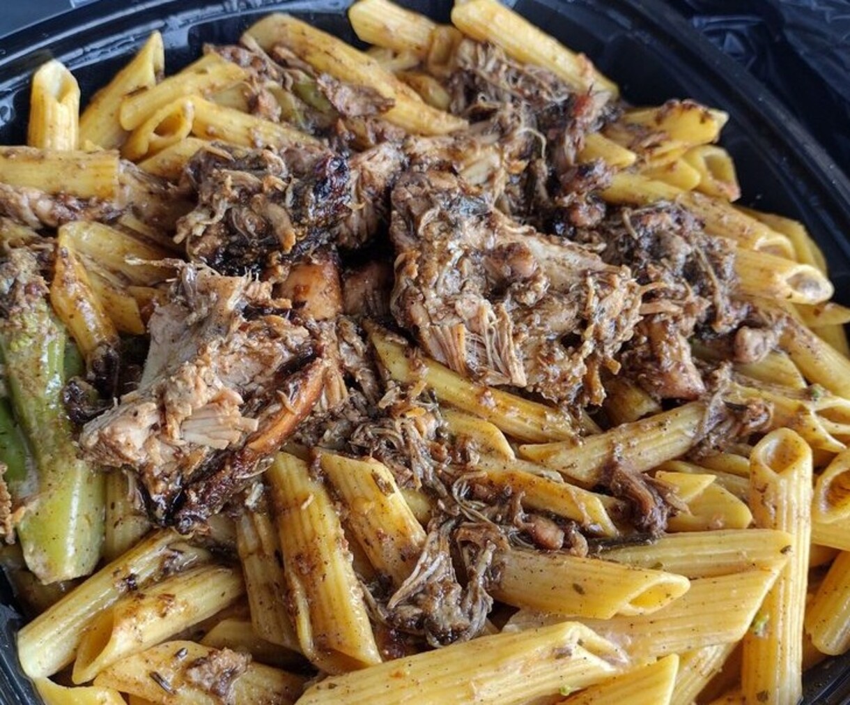 Jerk chicken pasta rasta at Stock and Grain Assembly located in High Point, NC. 