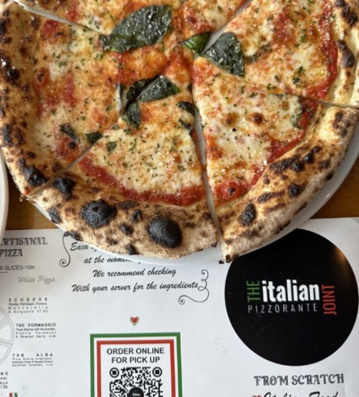 Margherita pizza at The Italian Joint located in Kissimmee, FL. 