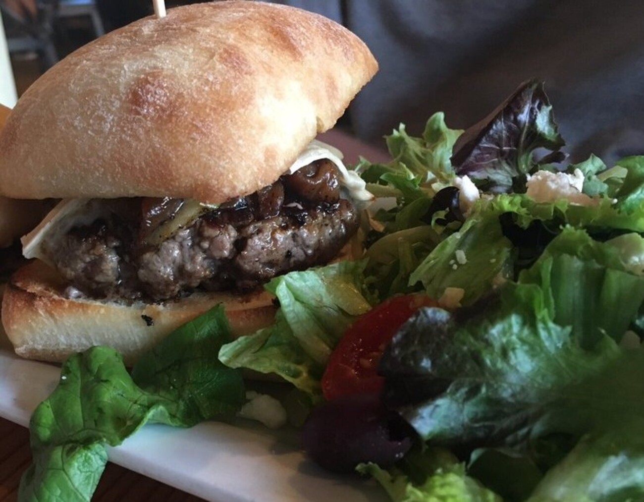 Pear burger with a black bean slider on the side at Avenue Eats located in Wheeling, WV. 