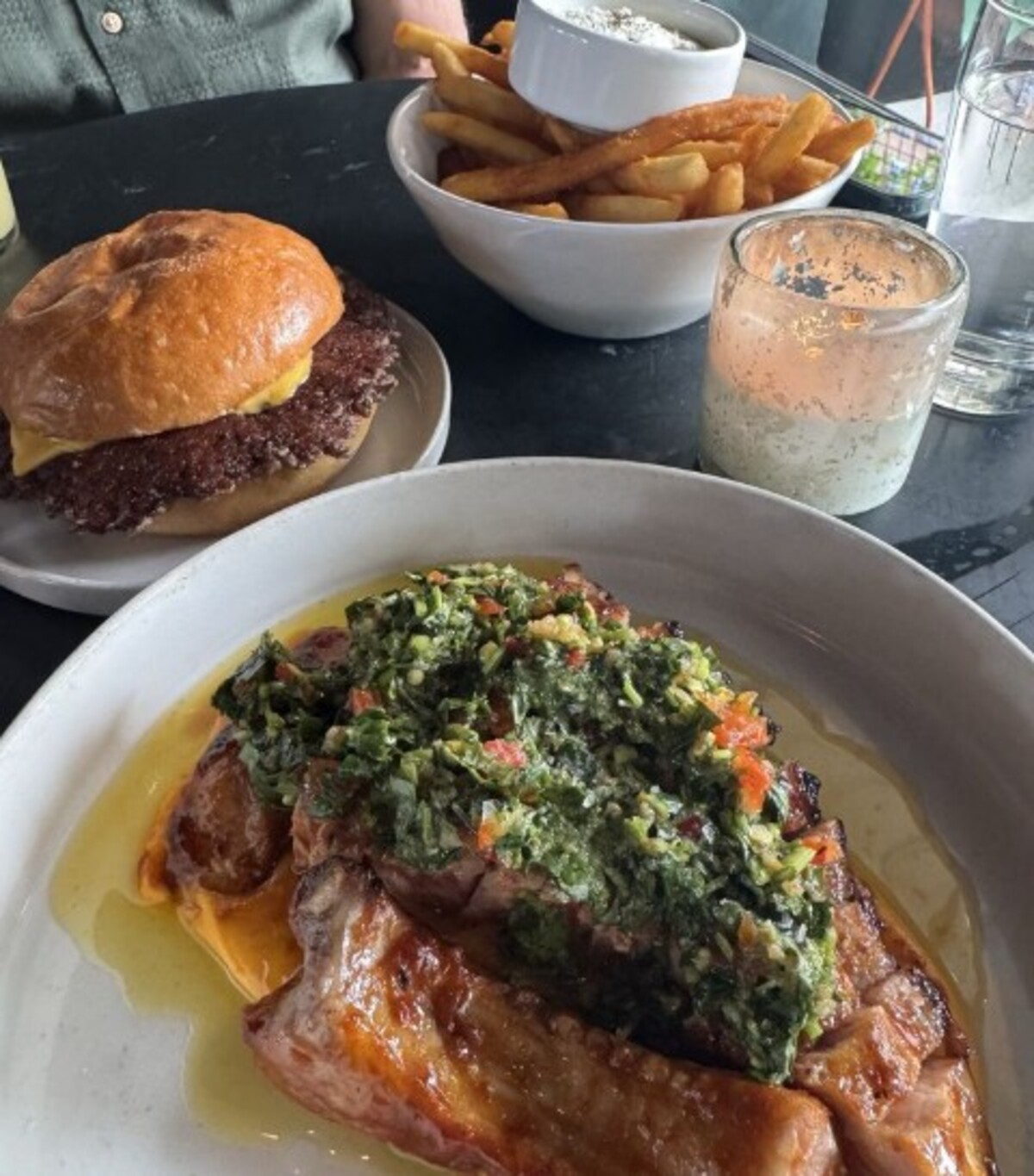 Pork chop, french fries, and burger at The Campground located in Kansas City, MO.