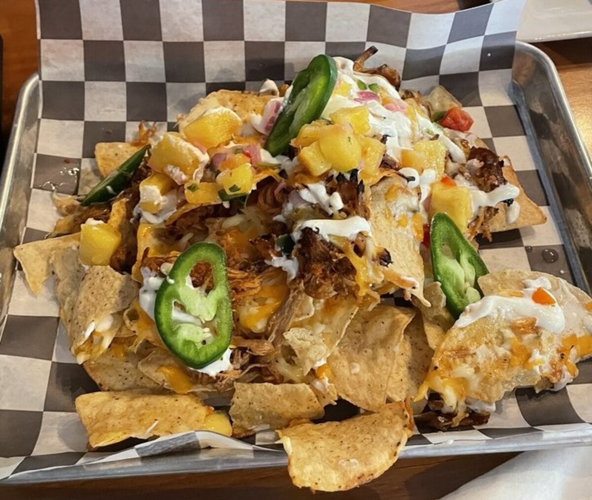 Pulled pork nachos at The Pour Farm Tavern located in New Bedford, MA. 