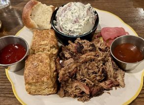 Pulled pork shoulder. Potato salad. Biscuits at Ruthie's All-Day located in Arlington, VA.