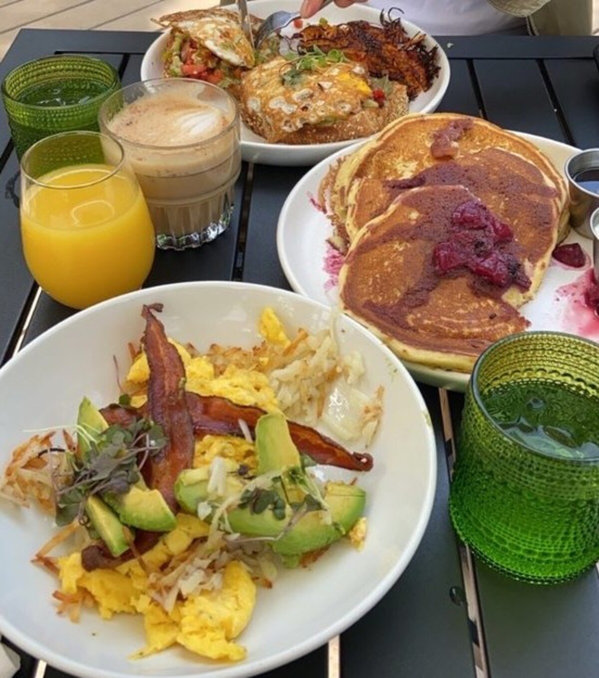 Seasonal pancakes , avocado toast and bacon n avocado bowl at Good Kitchen + Market located in Marietta, GA.