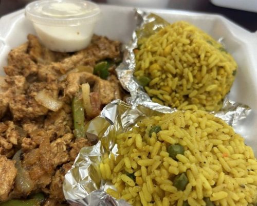 Shawarma Chicken, Rice, cucumbers at Chef Moussa located in Peoria, IL.
