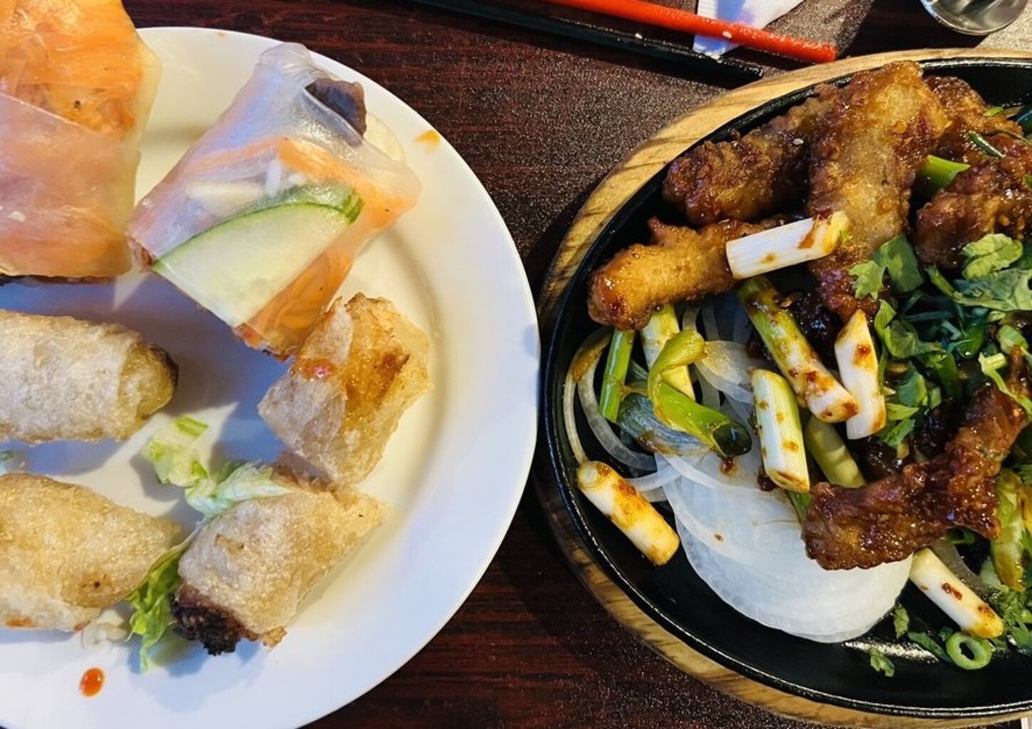 Sizzling Spicy Dry Fish Tilapia with Scallions + 2 Pieces Spring Rolls + 3 Piece Egg Rolls at Sizzling Kitchen located in Lowell, MA.