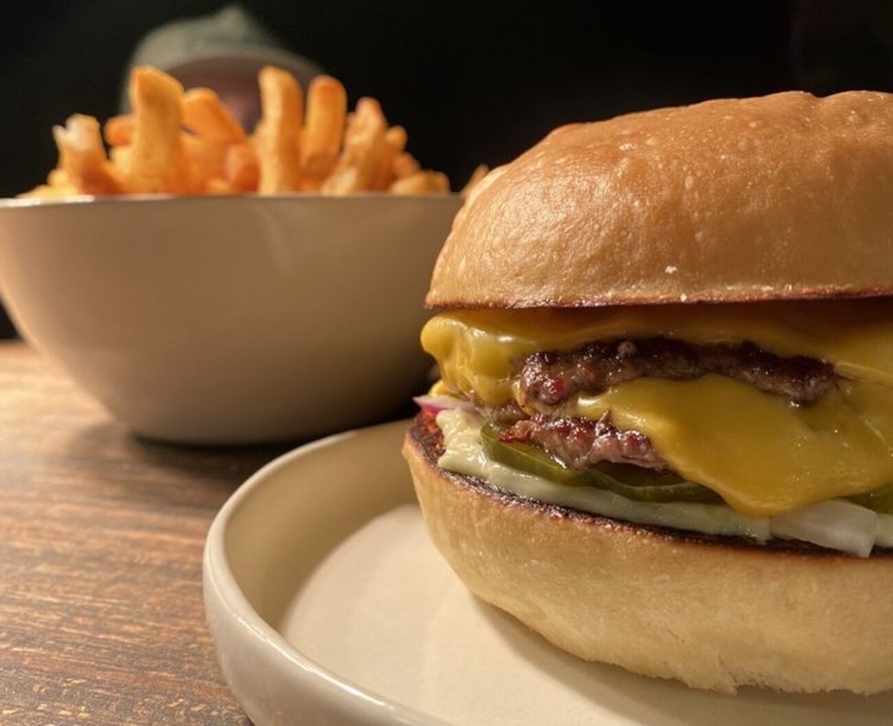 Smash burger and fries at The Campground located in Kansas City, MO.