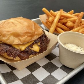 Smash burger and fries at The Campground located in Kansas City, MO.