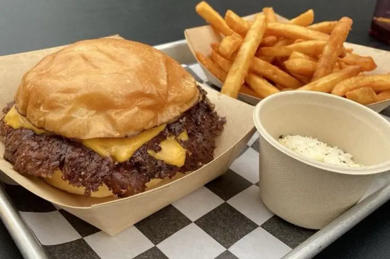 Smash burger and fries at The Campground located in Kansas City, MO.