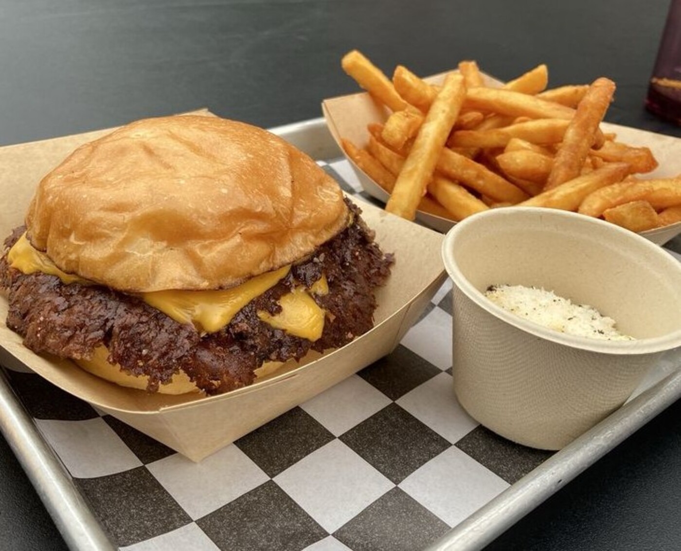 Smash burger and fries at The Campground located in Kansas City, MO.