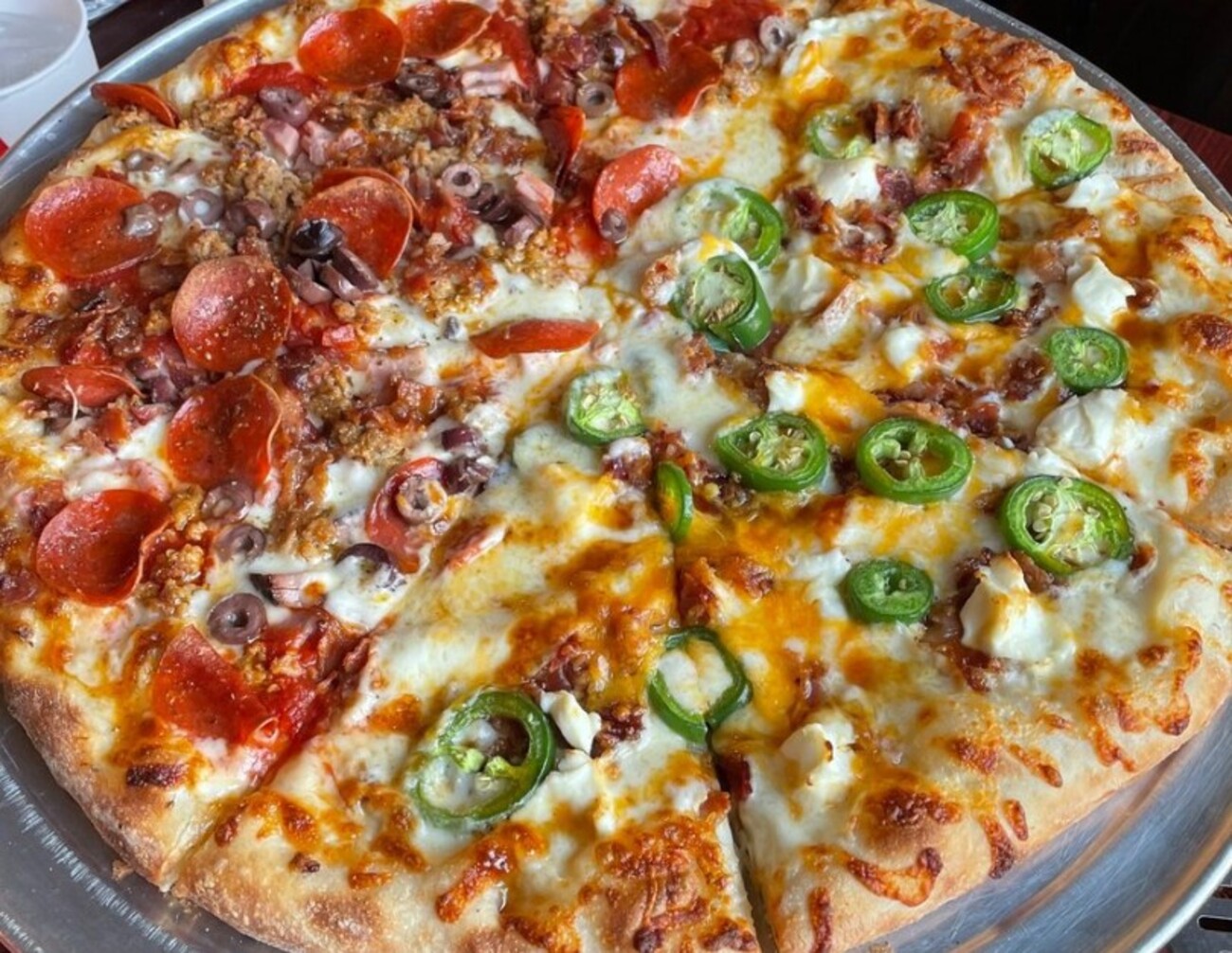 Smothers Park Meat Special Pizza 1/2 jalapeño Popper Pizza at Fetta Specialty Pizza & Spirits located in Owensboro, KY.   