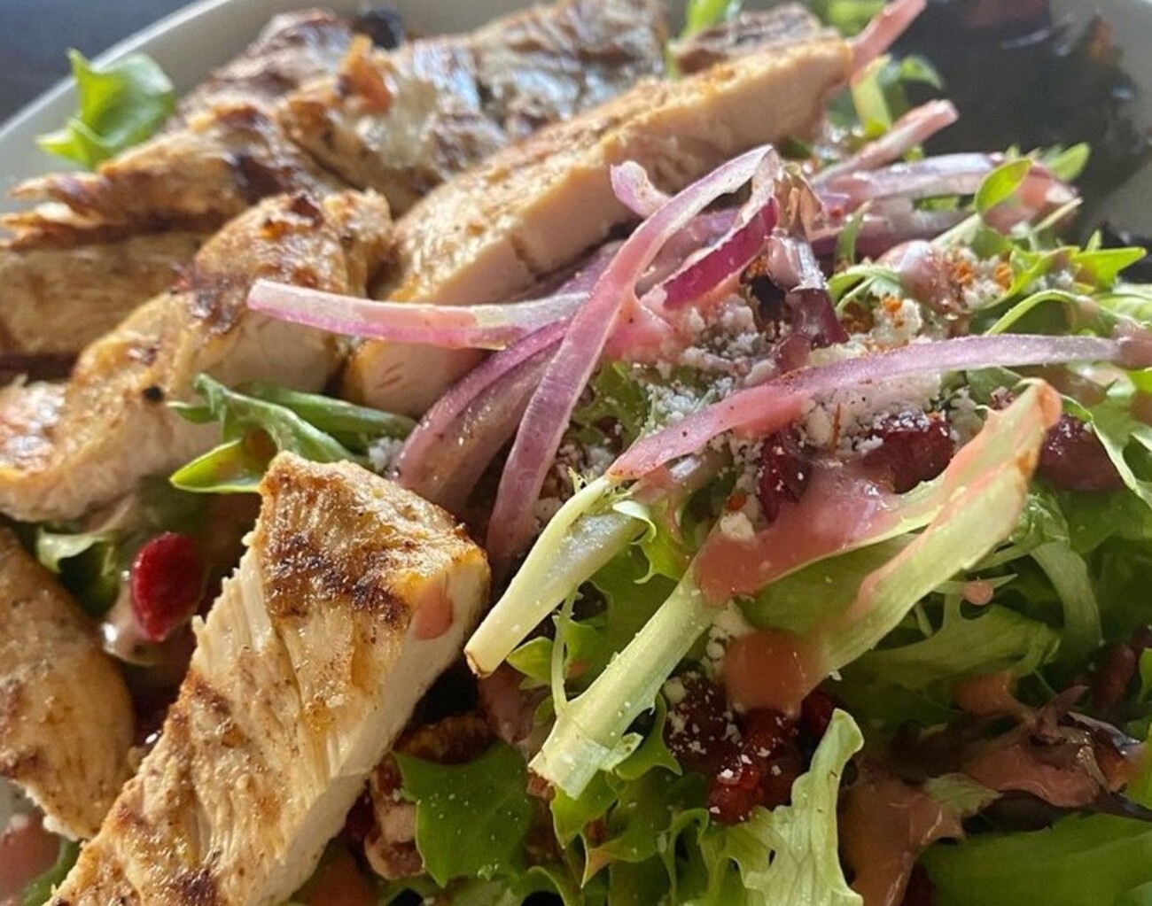 The Black Sheep Salad with the cactus- pear pomegranate at Black Sheep Cafe located in Provo, UT.
