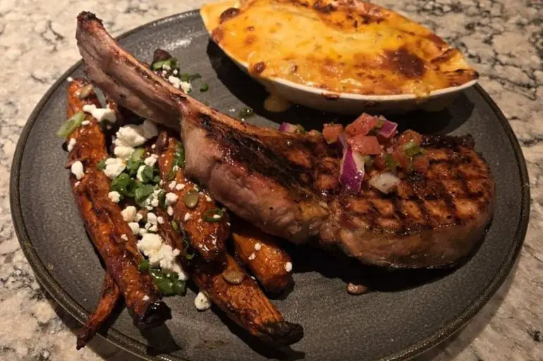 Tomahawk Pork Chop at Firebirds Wood Fired Grill located in Murfreesboro, TN.
