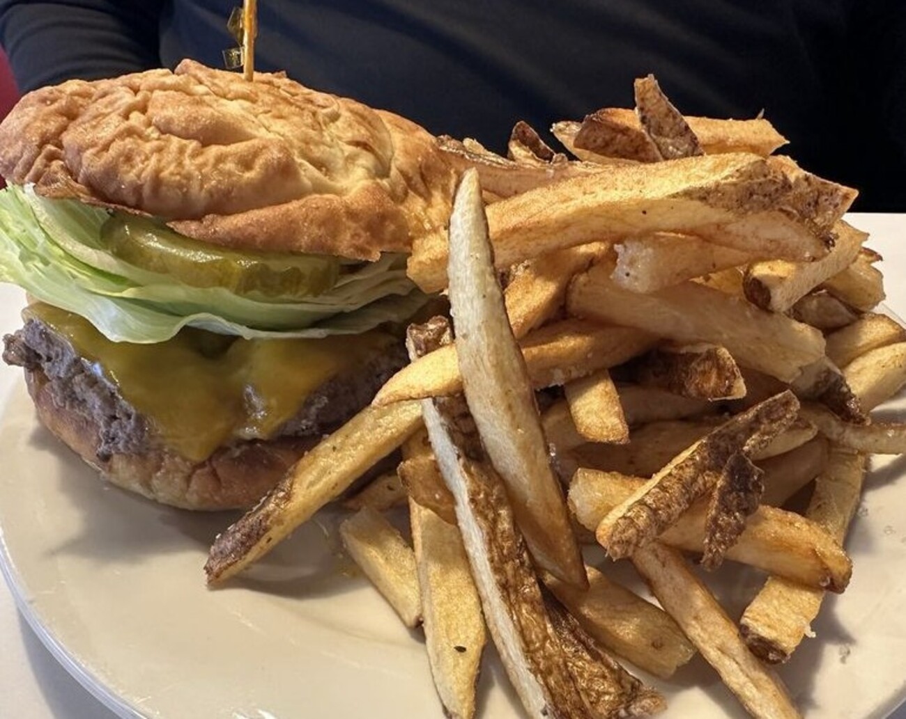 Twisted Bacon Cheeseburger with Twisted Fries at Twisted Burger Diner located in Flint, MI. 
