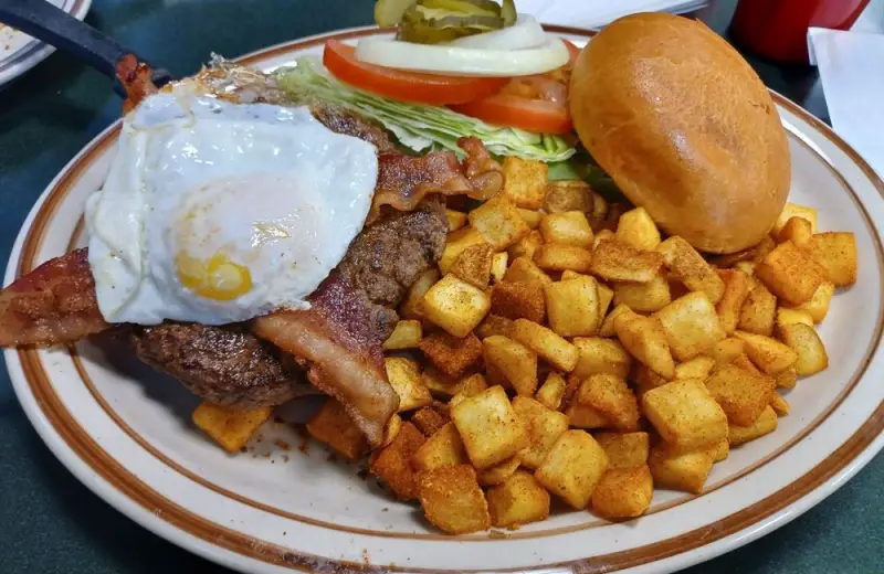 Breakfast burger with over easy egg