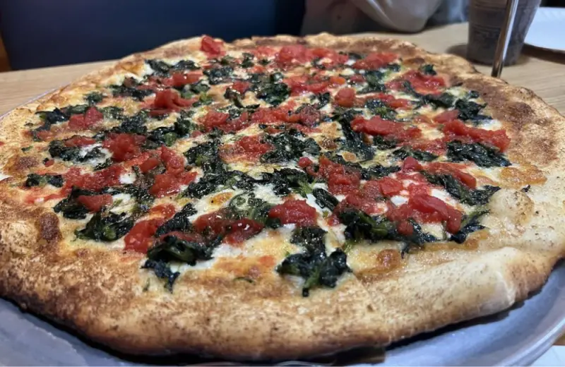 Margherita-style pizza with spinach