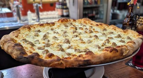 White Pizza with Sausage at Rosalee's Pizzeria in Longmont, Colorado
