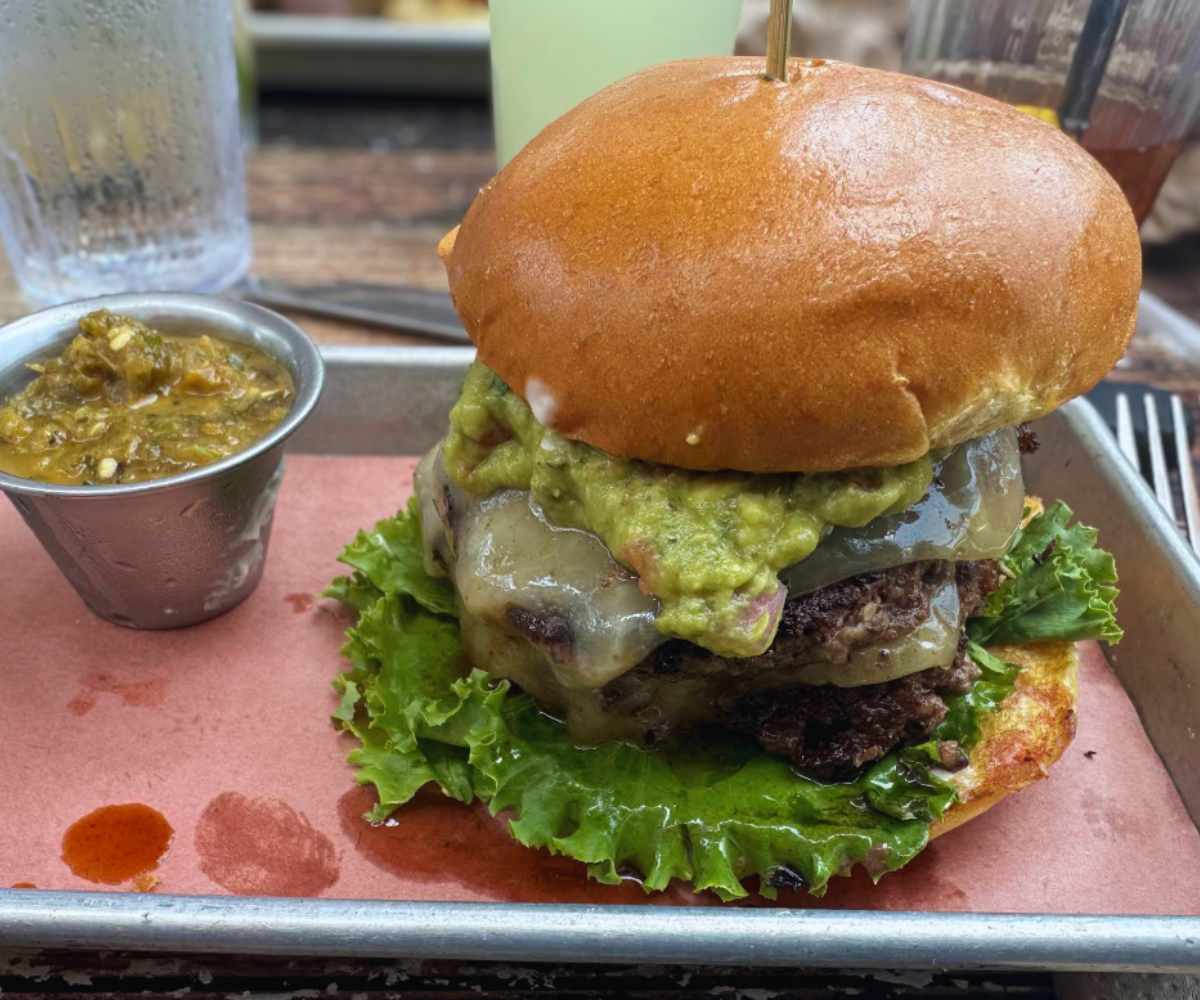 burger with guacamole at LSA Burgers in Denton, Texas