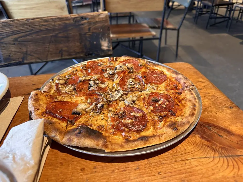 pizza pepperoni mushroom and onion.