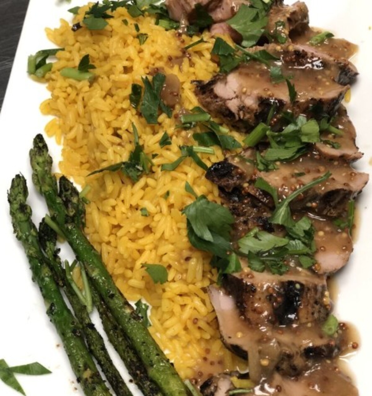 pork tenderloin special with madeira mustard sauce special at Retro Rocks located in Saginaw, MI. 