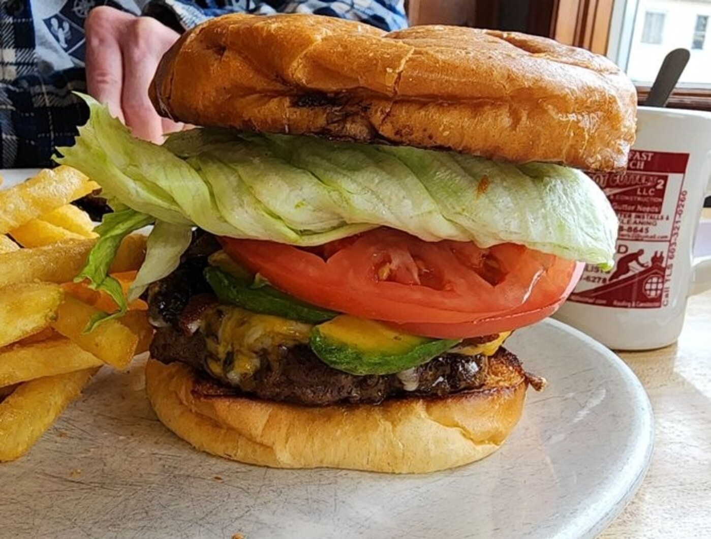 stacked burger at The Corner Cafe located in Lowell, MA. 