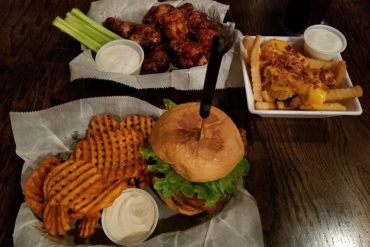 tenderloin, sweet potato fries, loaded cheese fries and wings at Savage's Ale House located in Muncie, IN.