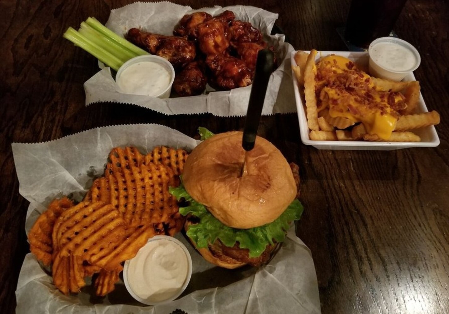 tenderloin, sweet potato fries, loaded cheese fries and wings at Savage's Ale House located in Muncie, IN.