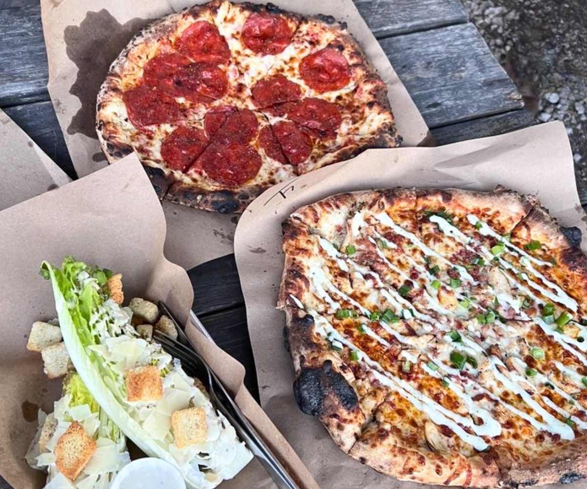 pizzas and salad at Fire Street Pizza in Belton, TX
