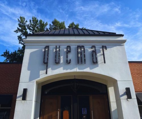 Quemar Store Front Logo