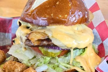 Oktoberfest Dad Bod Brat Burger at Roots Burger Bar in Muncie, IN