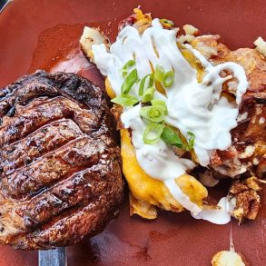 Bison steak with loaded potato at Deadwood Social Club in Deadwood, SD