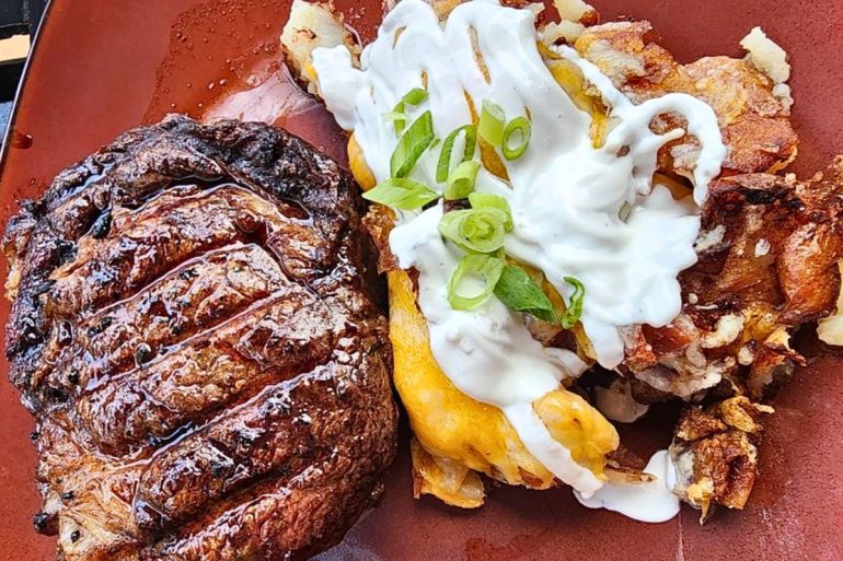 Bison steak with loaded potato at Deadwood Social Club in Deadwood, SD