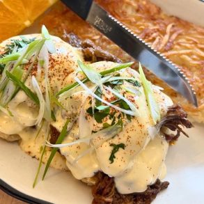 Eggs Benedict with Pulled Pork & Fried Green Tomatoes at Hot Suppa in Portland, Maine