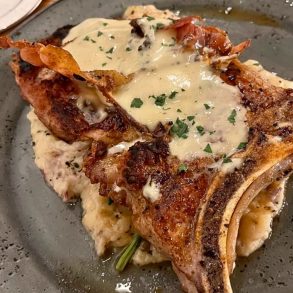 Saltimbocca Pork Chop at TASTE Italian Kitchen in Starkville, Mississippi